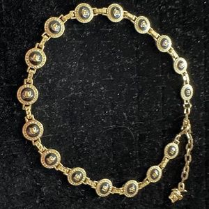 Very light weight gold and back necklace